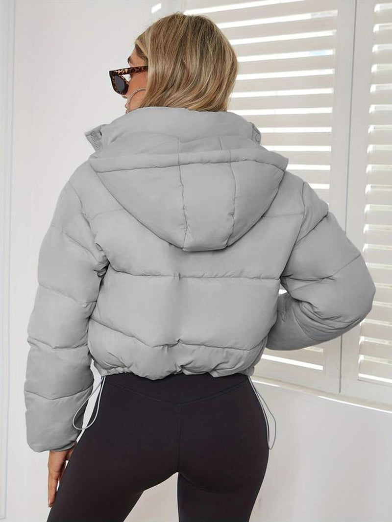 Stay Cozy and Chic This Winter with Our Women's Solid Long Sleeve Collared Short Puffer Coat - Featuring Warm Drawstring Pockets and Stylish Zipper Button Front
